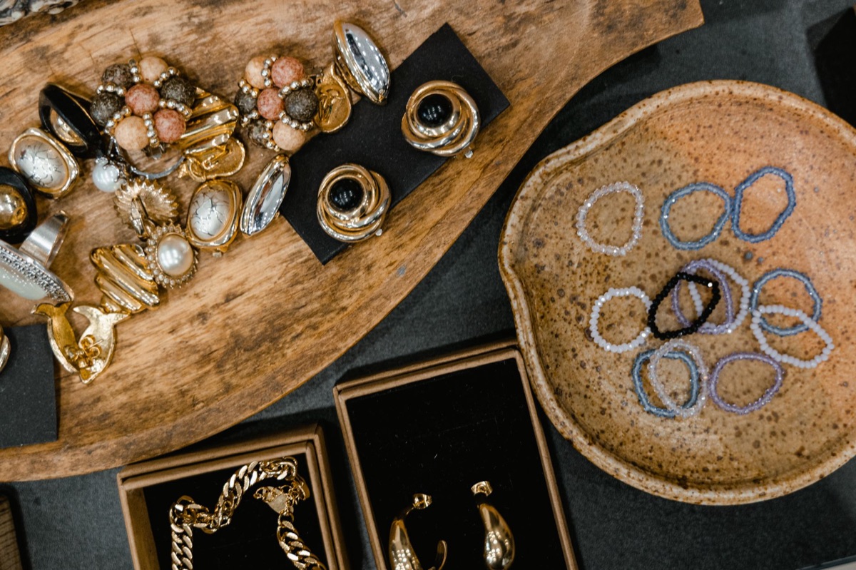 Luxury accessory collection on velvet surface